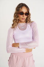 PERFORMANCE LONG SLEEVE CROP TOP GLOW